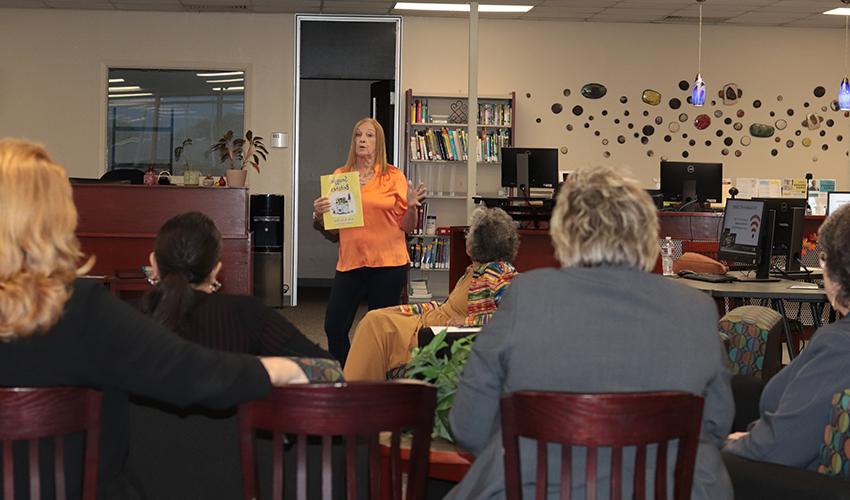 Vicki Marvel standing in front of the audience giving her presentation. 